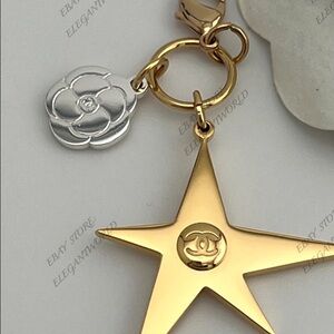 Authentic CHANEL  Limited Edition  Gold and Silver Star Charm Keychain 2025